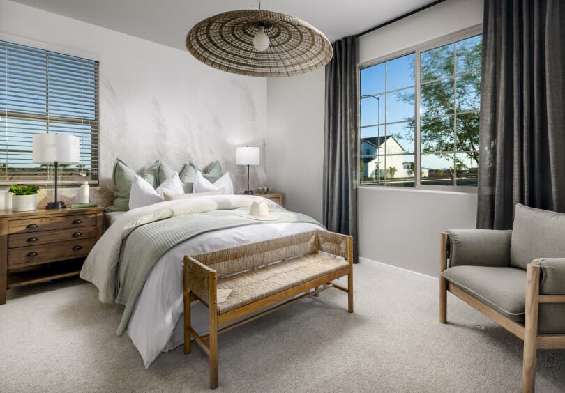 Primary bedroom in Lily floor plan in Mariposa Collection at Blossom Rock in Apache Junction AZ