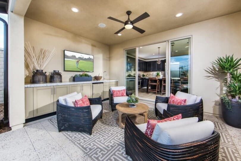 Outdoor seating area with a tv in a Brookfield Residential home