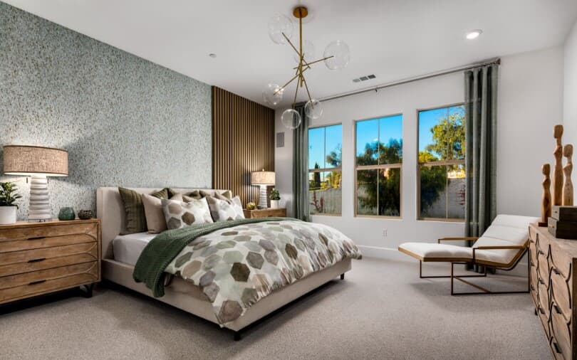 Primary bedroom in Villa Plan 2 at Los Coyotes by Brookfield Residential in Buena Park CA