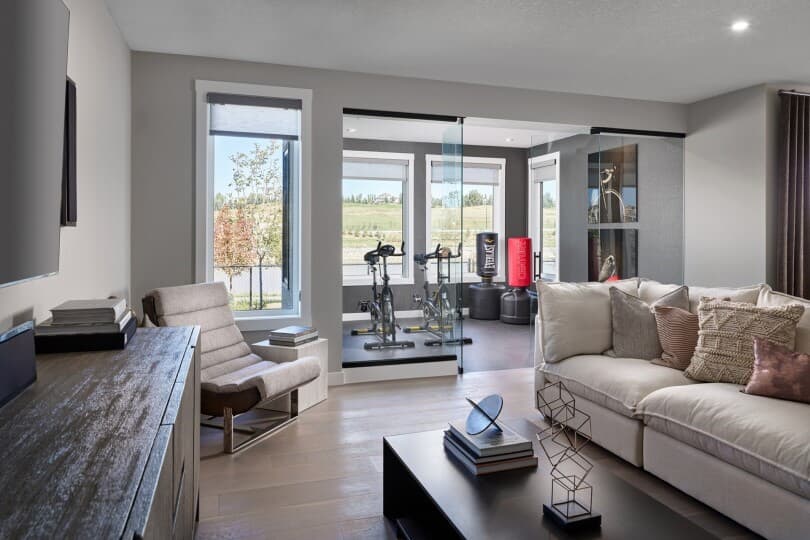 Home gym in the basement of Palermo at Rockland Park by Brookfield Residential in Calgary AB
