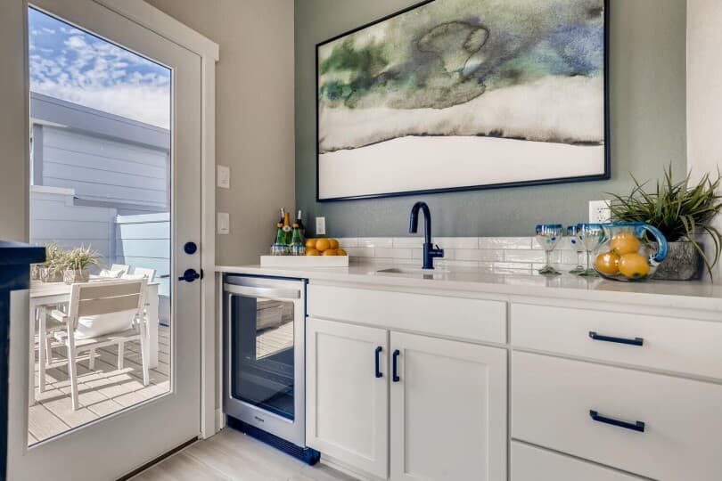 Home bar in Cadence 5 in Townhomes at Midtown by Brookfield Residential in Denver CO
