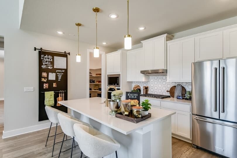 Kitchen in Columbia plan of Urban Courtyard Homes Collection at Easton Park in Austin TX