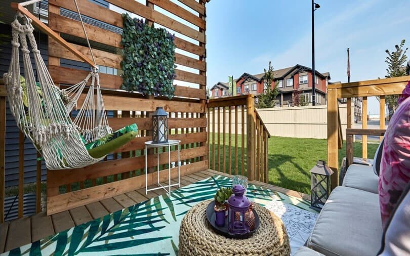 Patio detail with a hammock at Alma by Brookfield Residential in Edmonton