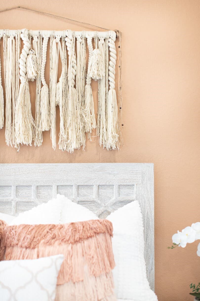 Macrame wall hanging above a bed in a Brookfield Residential home in Austin TX