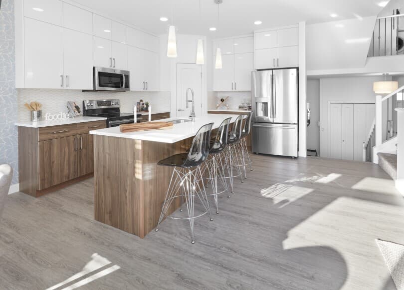 Two tone cabinetry in the Elias kitchen at Edgemont in Edmonton, Alberta