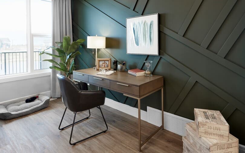 Hunter green millwork feature wall at Hudson in Chappelle Gardens in Edmonton, AB