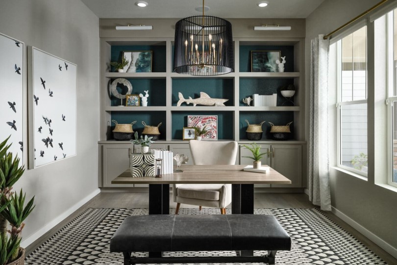 Home office with shelving in the Ovation 3 at Barefoot Lakes in Colorado