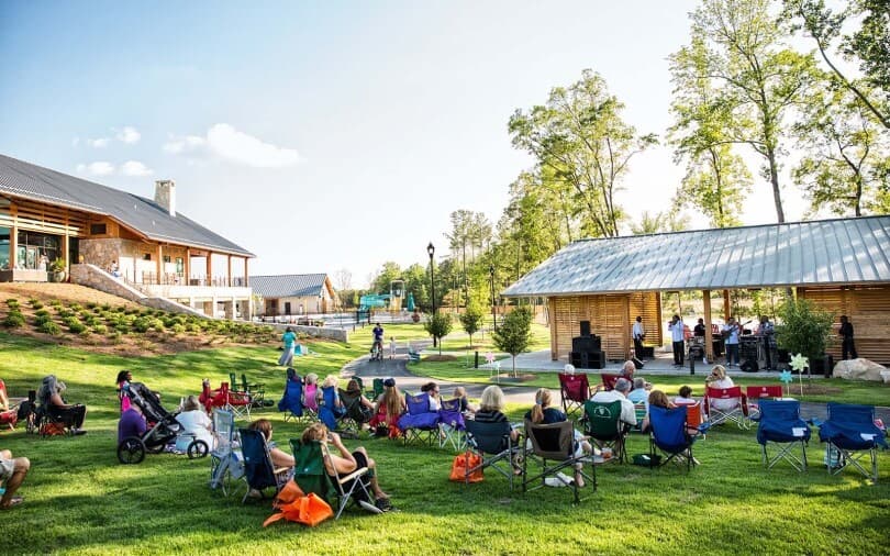 Neighbors enjoying live music at Wendell Falls by Brookfield Residential in Wendell NC