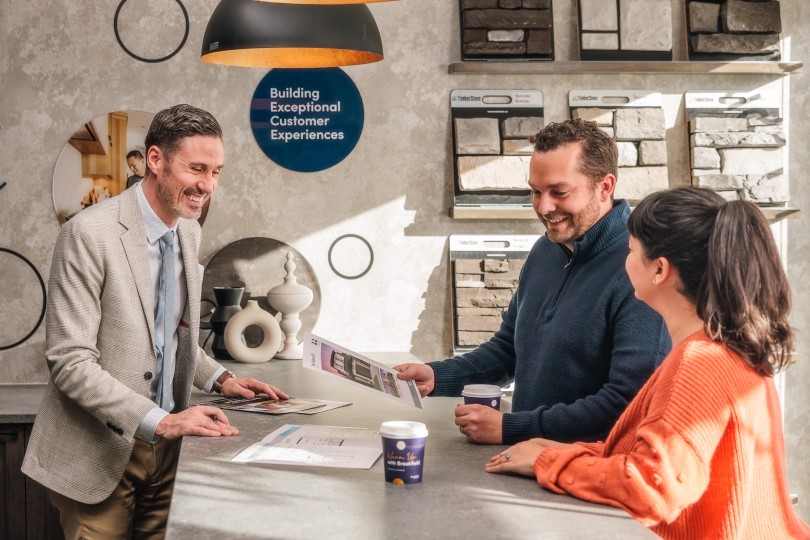 Home buyers meeting with a Brookfield Residential sales team member