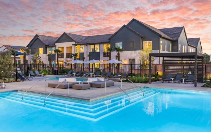 Exterior view of homes and pool at New Haven by Brookfield Residential in Ontario CA