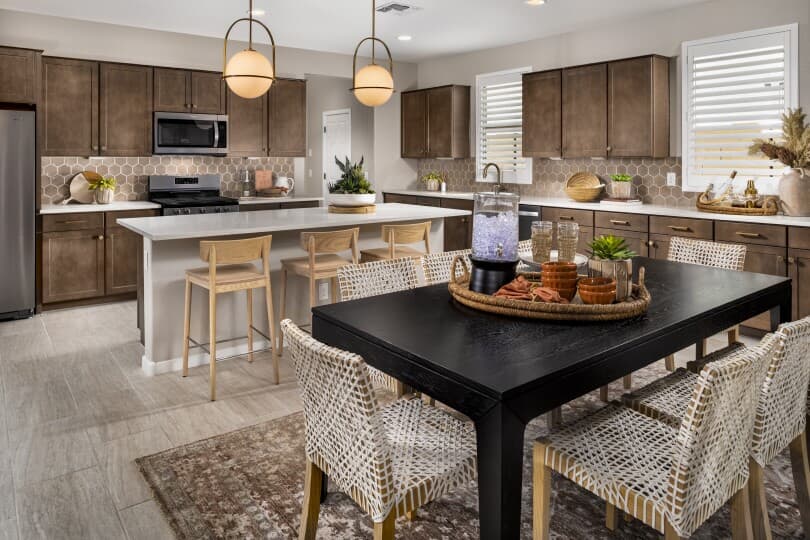 Dining to kitchen view in Azure floor plan at Highland Sage at Alamar in Avondale AZ