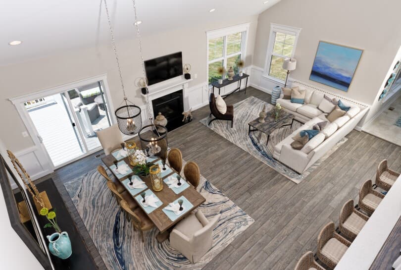 Aerial view of the dining and living rooms in the Weymouth floor plan at Waterford Manor in Leesburg, VA