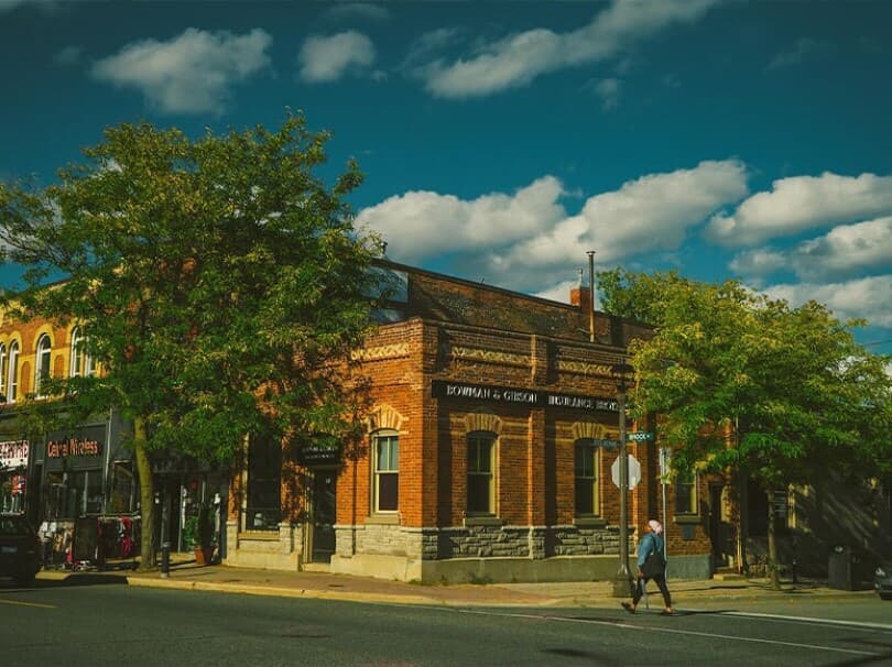 Brick building and trees in Downtown Whitby, ON