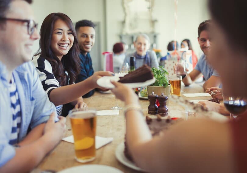 Friends enjoying food and drinks