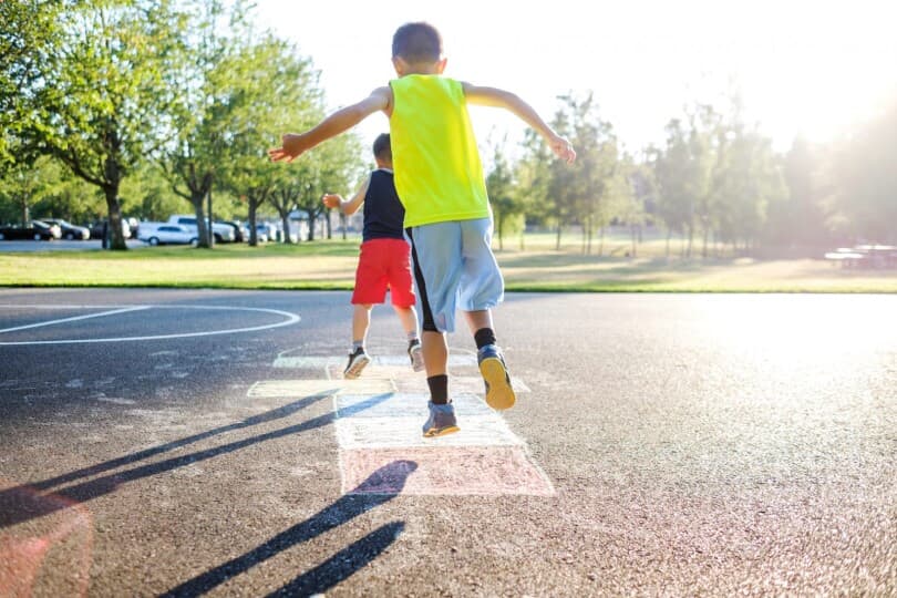 Kids playing hopscotch in the park at Boulevard in Dublin, CA
