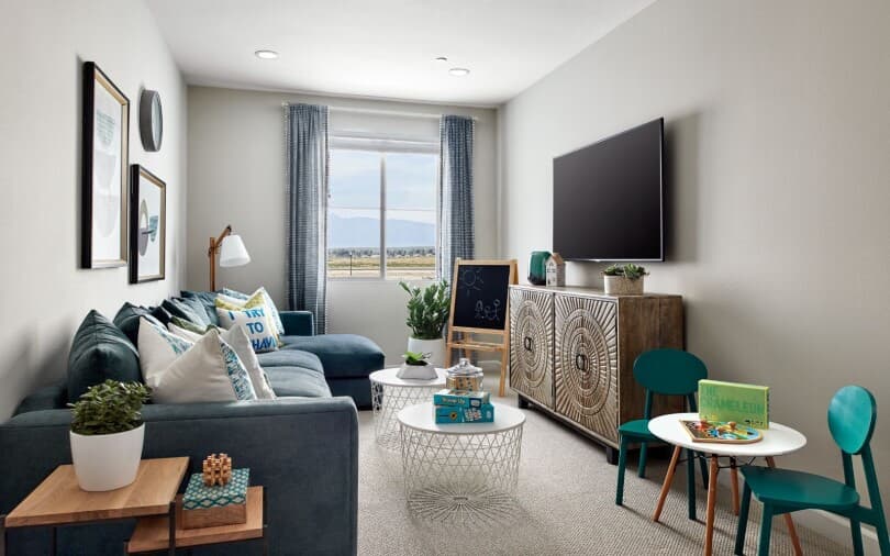Loft with tv and kid space in the Plan 1 at Indigo at Canvas Park at New Haven in Ontario Ranch, CA