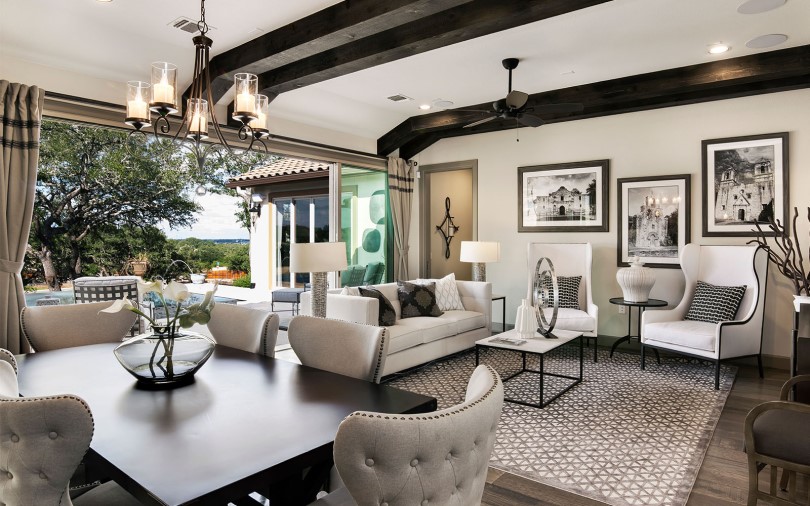 Interior view of the dining and great room at the Clarkson in the Traditional Collection at Kissing Tree in TX