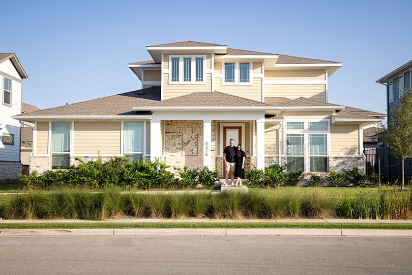 Homeowners in front of their home in Easton Park, Austin Texas