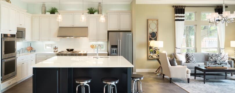 Kitchen and living area in a Brookfield Residential home at Elyson in Katy TX