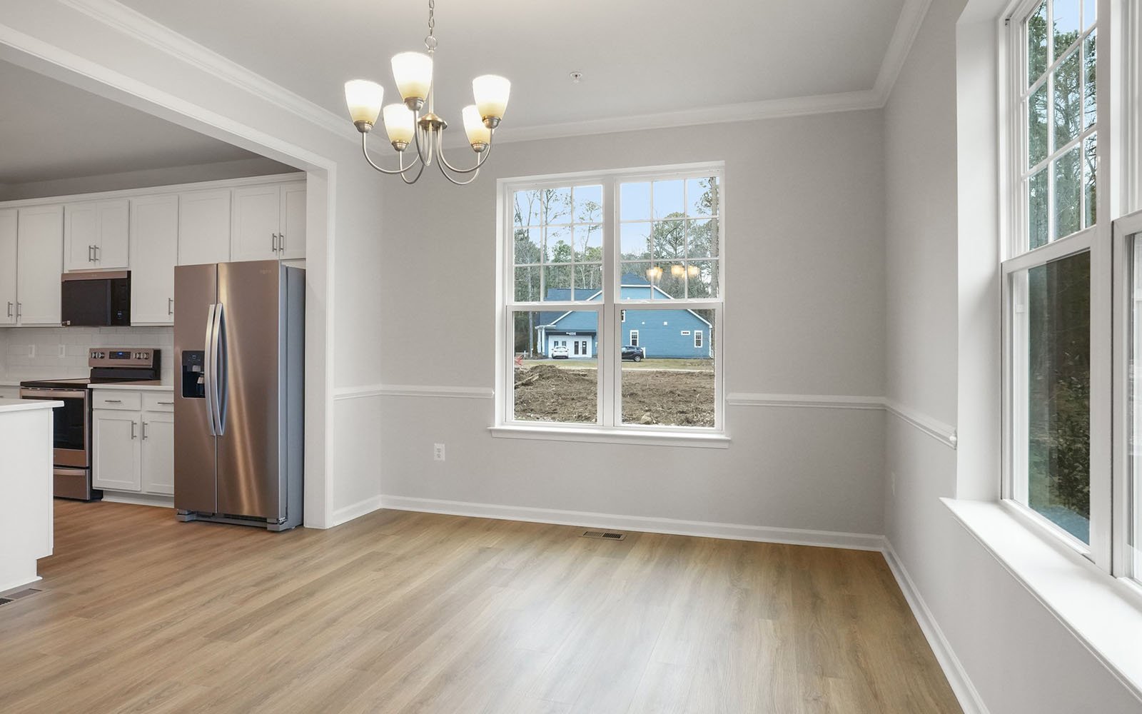 The dining room of the Savoy II on homesite 3008 at Swan Point.