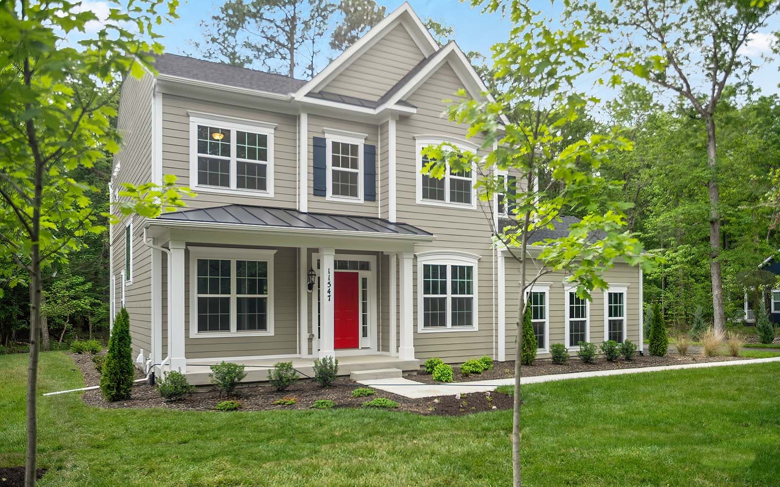 The front exterior of the Kendrick on homesite 3037 at Swan Point.