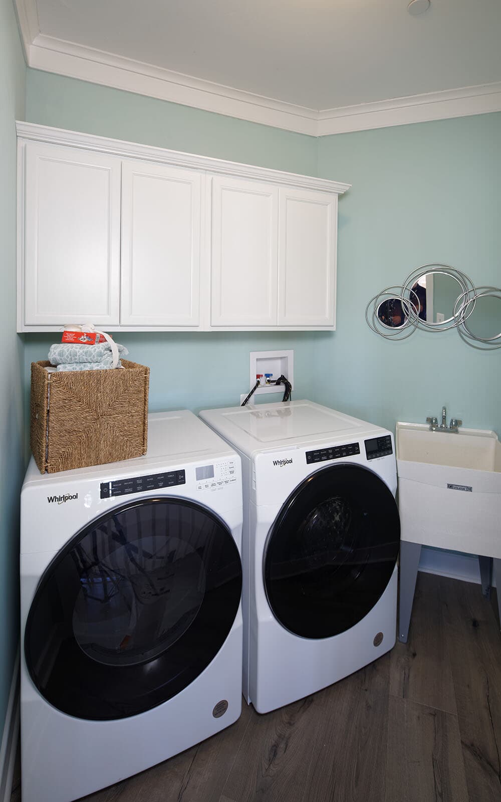 The laundry room of the Beckham by Brookfield Residential