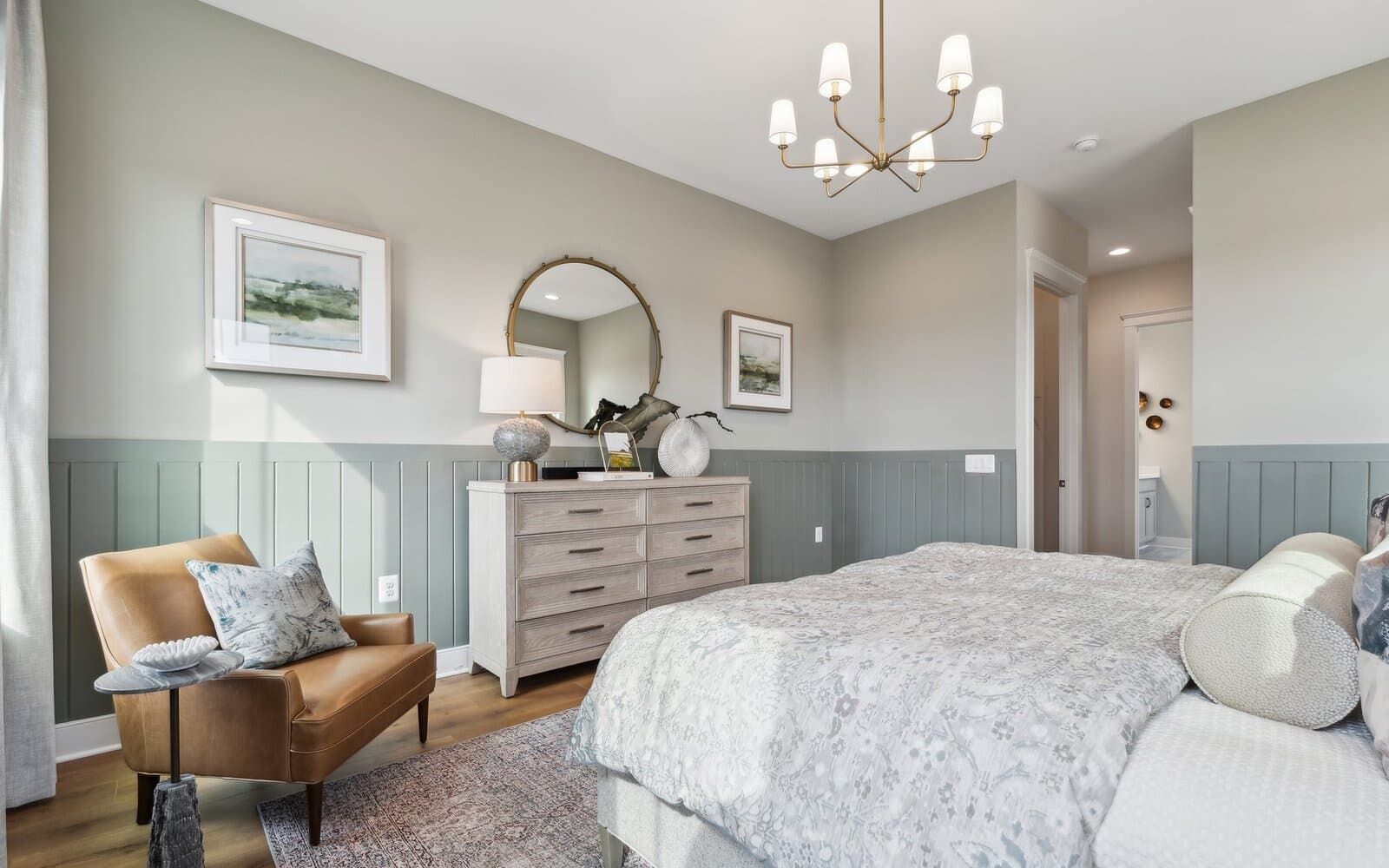 The primary bedroom in the Matisse model single family home at Lakeside at Trappe by Brookfield Residential.
