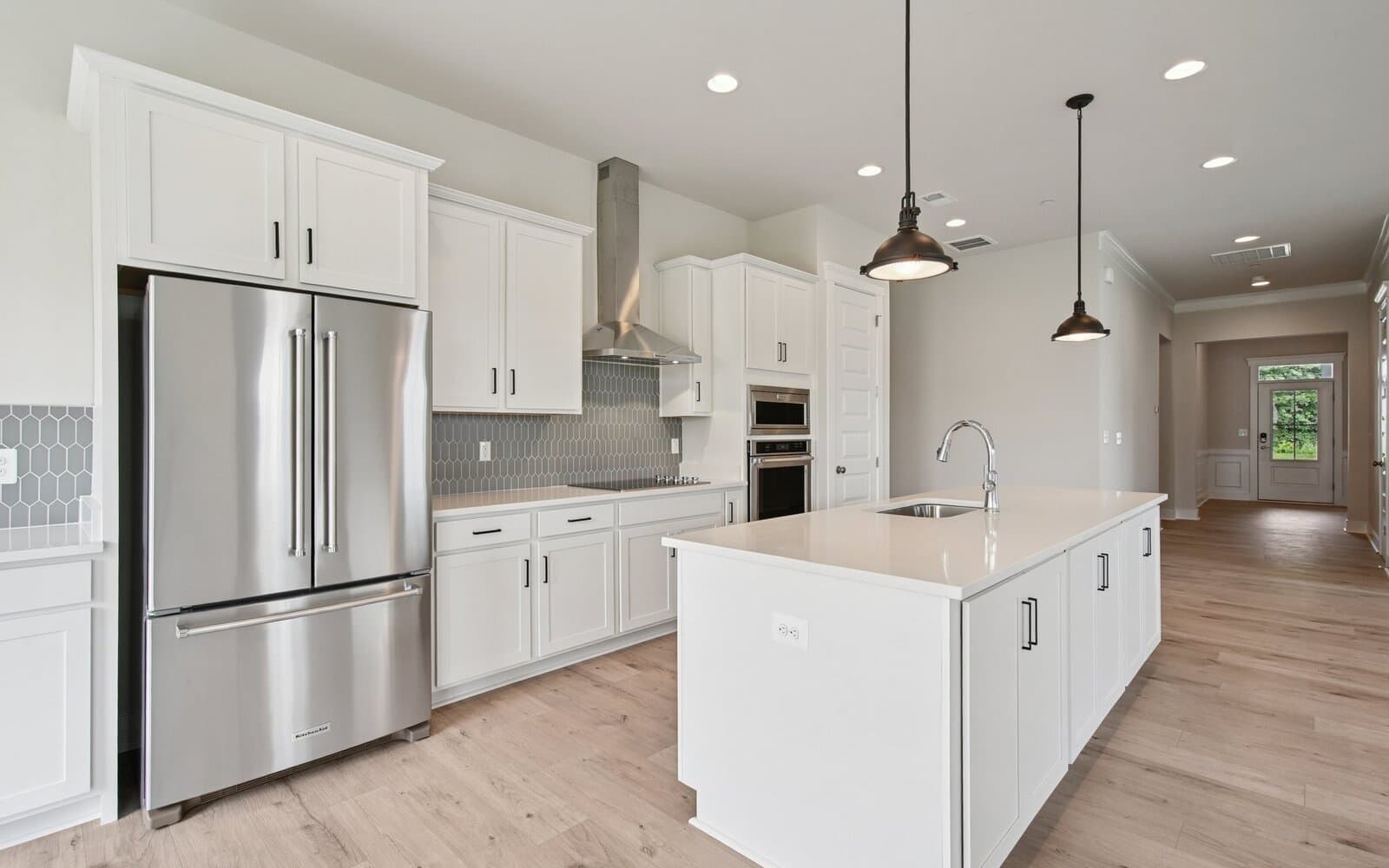 The kitchen of the Rembrandt on homesite 1130 at Lakeside at Trappe by Brookfield Residential.