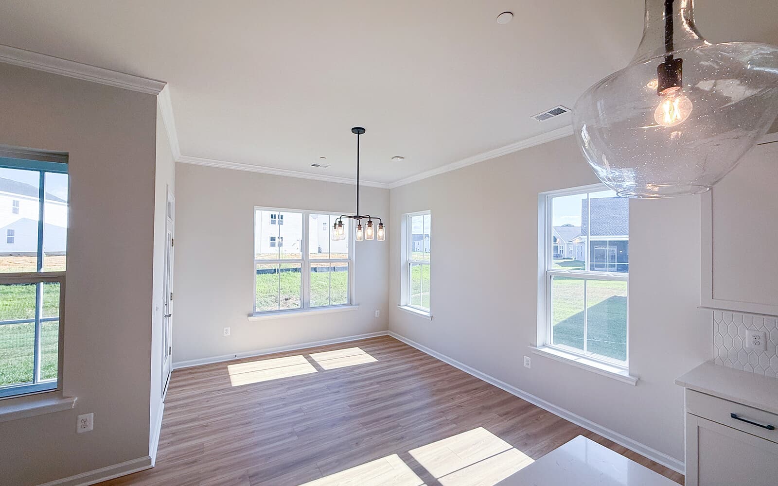 The dining room of the Matisse on homesite 1132 at Lakeside at Trappe by Brookfield Residential.