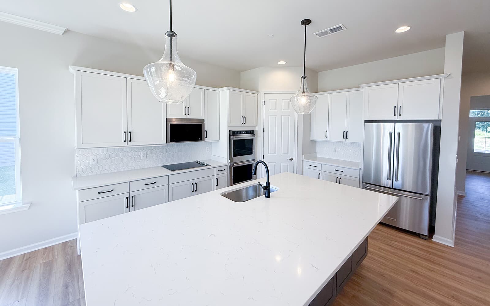 The kitchen of the Matisse on homesite 1132 at Lakeside at Trappe by Brookfield Residential.
