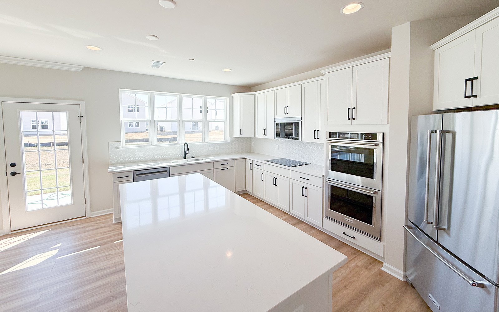 The kitchen in the Beckham on homesite 1134 at Lakeside at Trappe by Brookfield Residential.