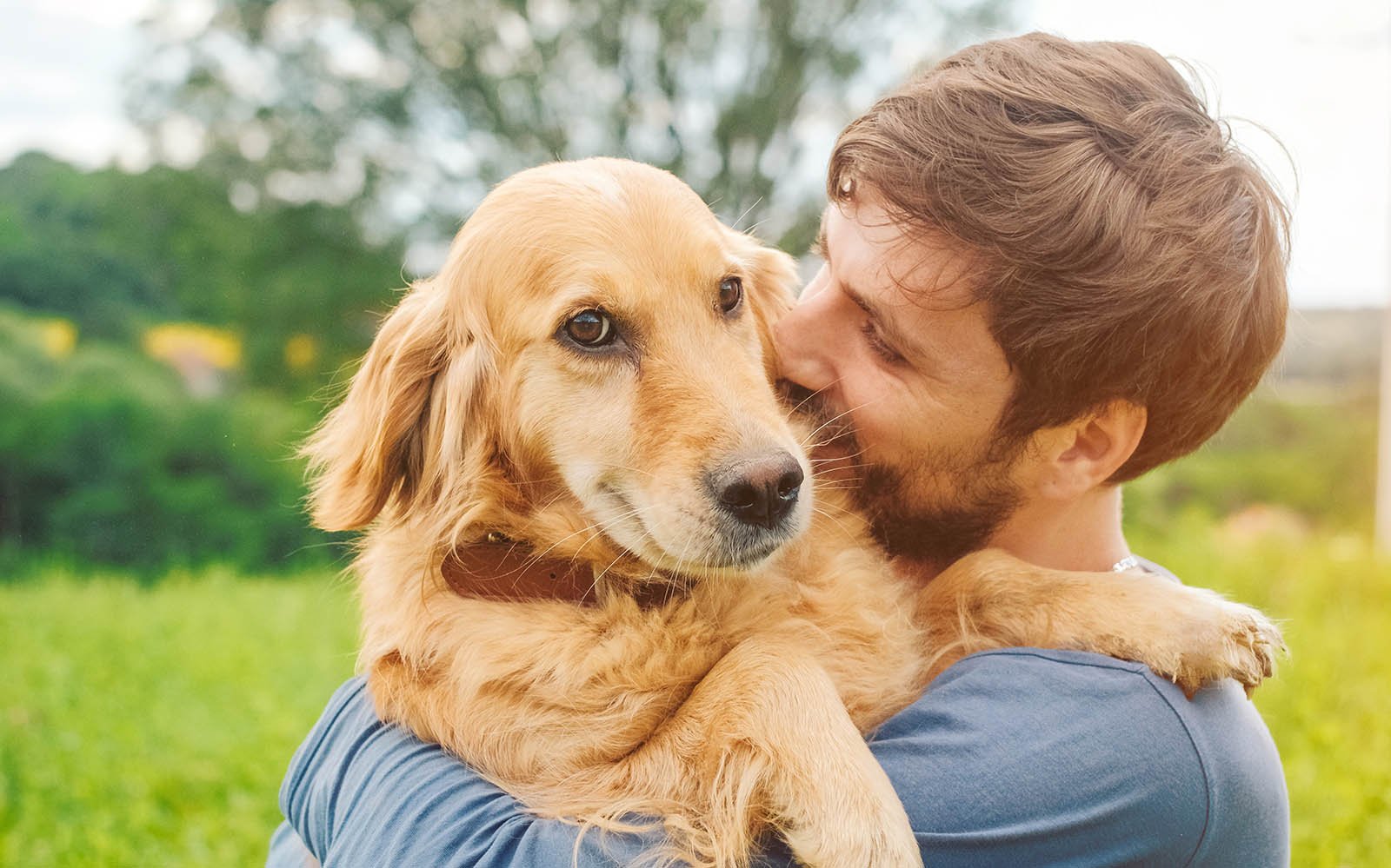 A man and a dog.