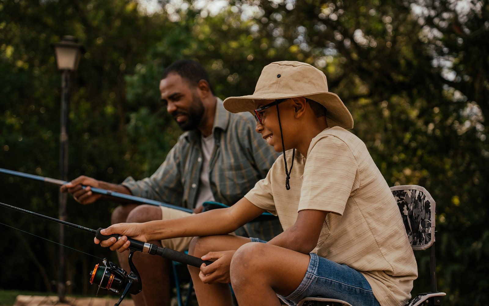 A father and child fishing.