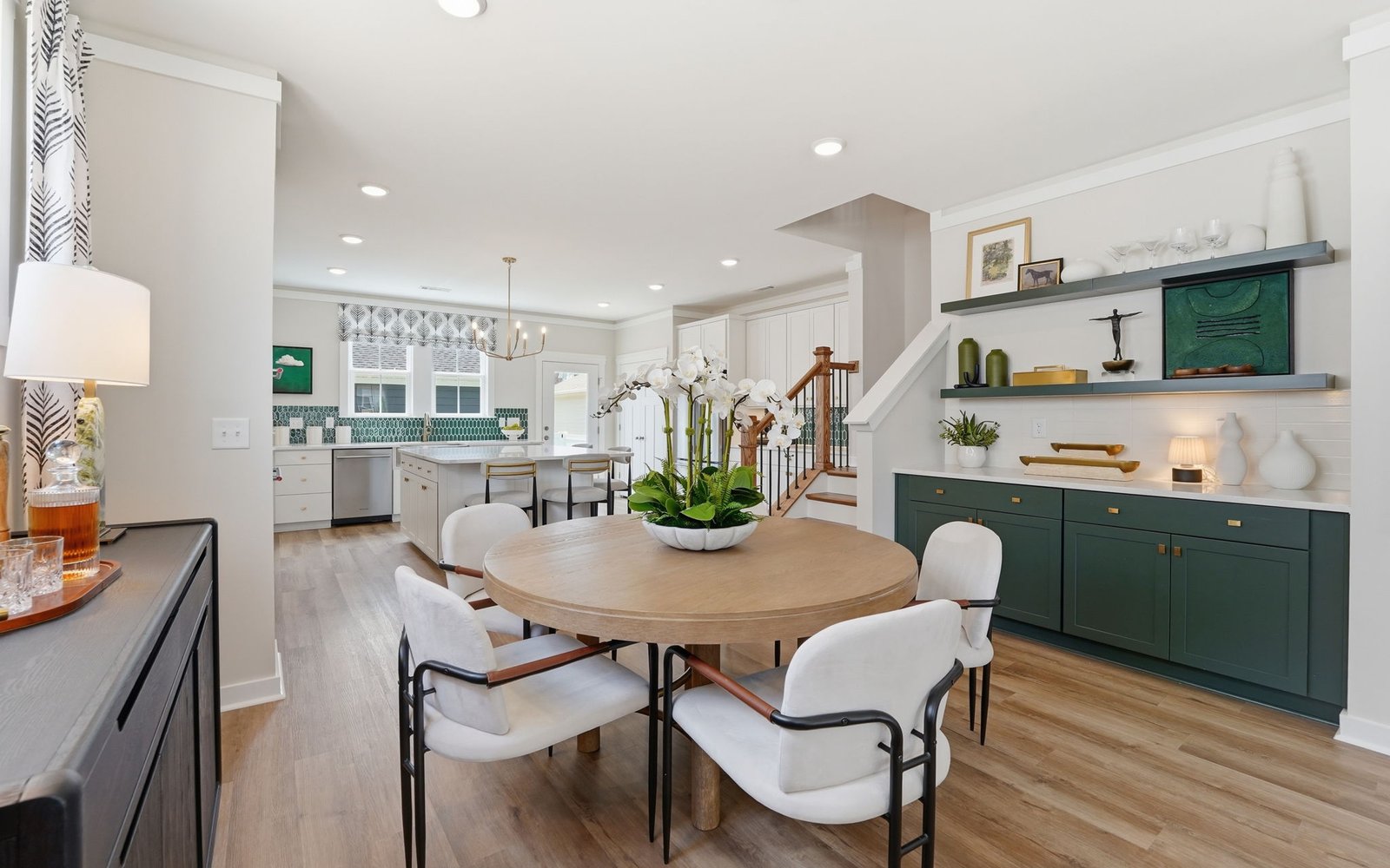 The dining room and kitchen of the Archer single family home by Brookfield Residential.
