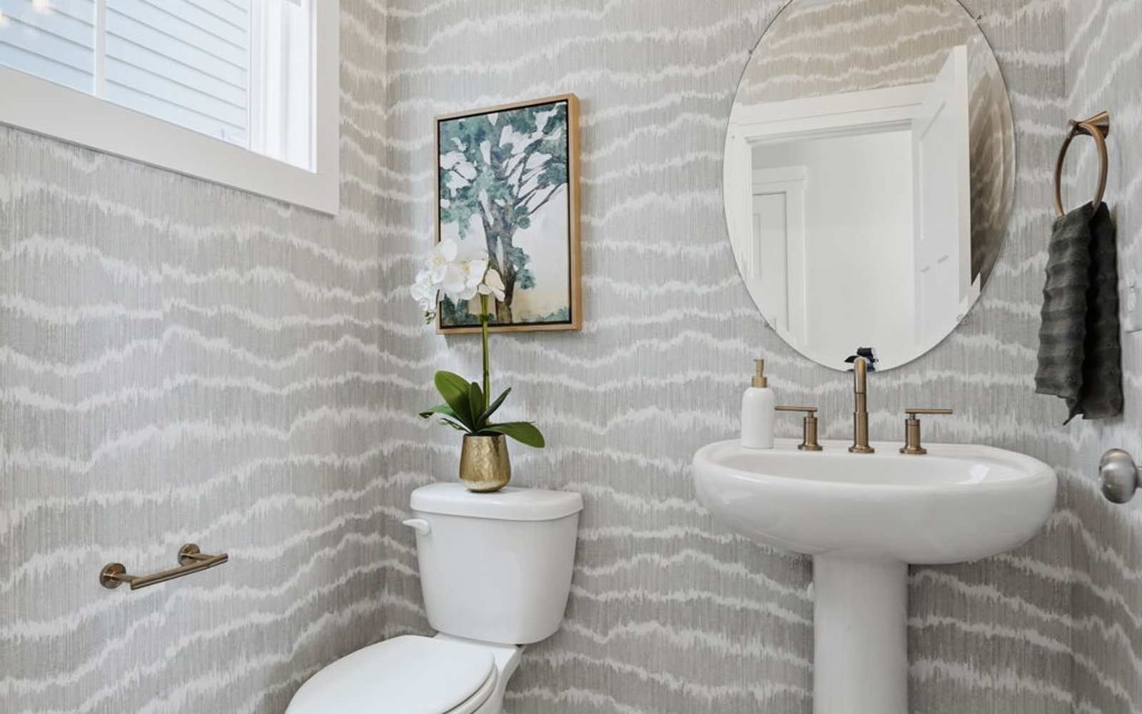 The powder room of the Archer single family home by Brookfield Residential.