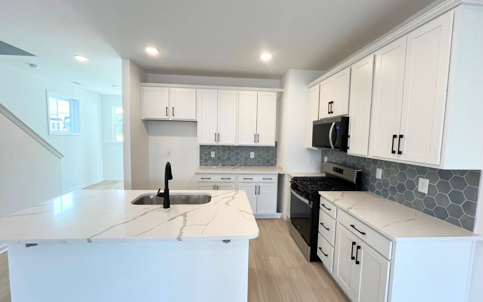 The kitchen in the Carter by Brookfield Residential at Wendell Falls.