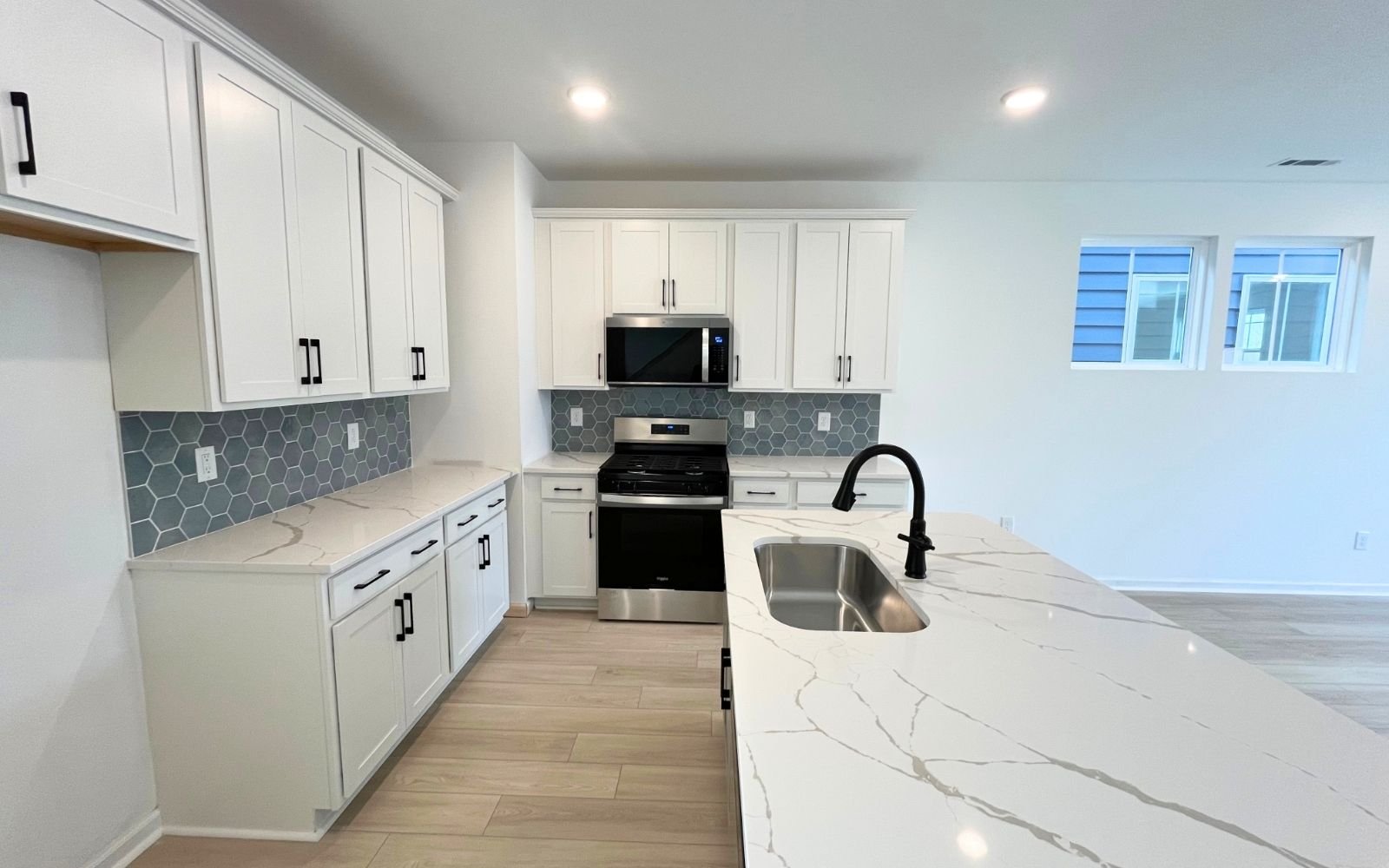 The kitchen of the Carter by Brookfield Residential at Wendell Falls.