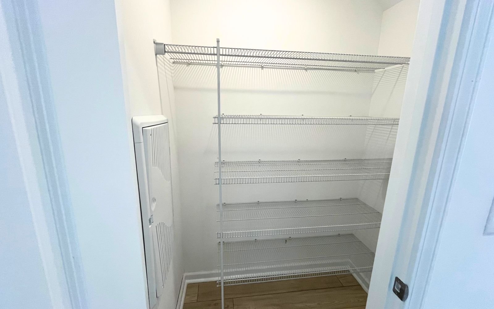 The kitchen pantry of the Carter by Brookfield Residential at Wendell Falls.