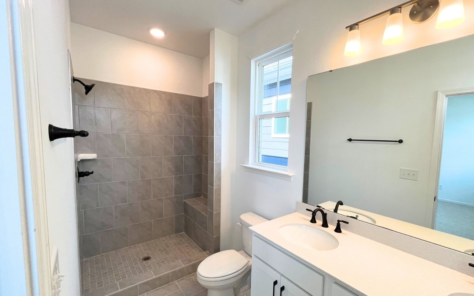 The primary bathroom of the Carter by Brookfield Residential at Wendell Falls.