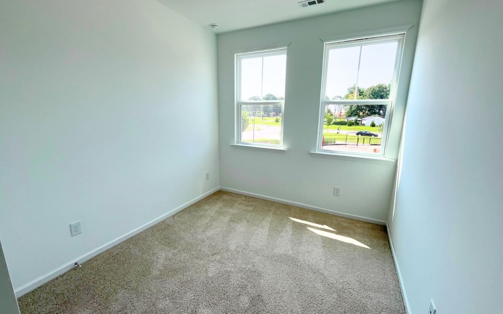 A secondary bedroom of the Carter by Brookfield Residential at Wendell Falls.