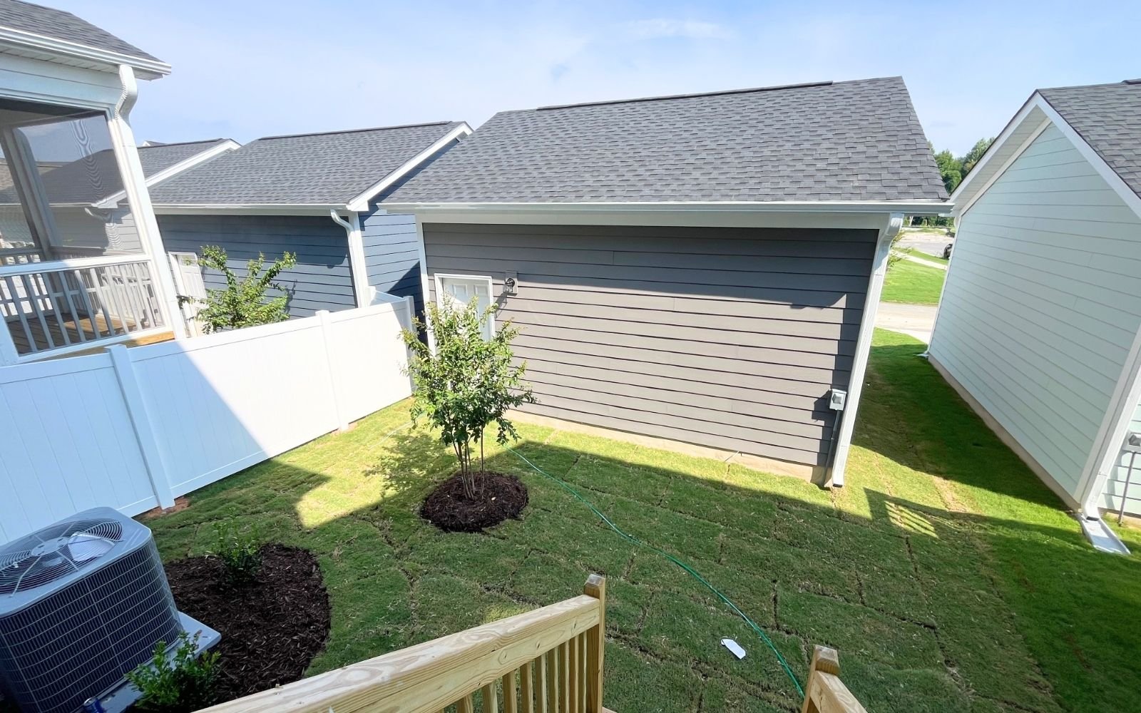 The rear yard and garage of the Carter by Brookfield Residential at Wendell Falls.