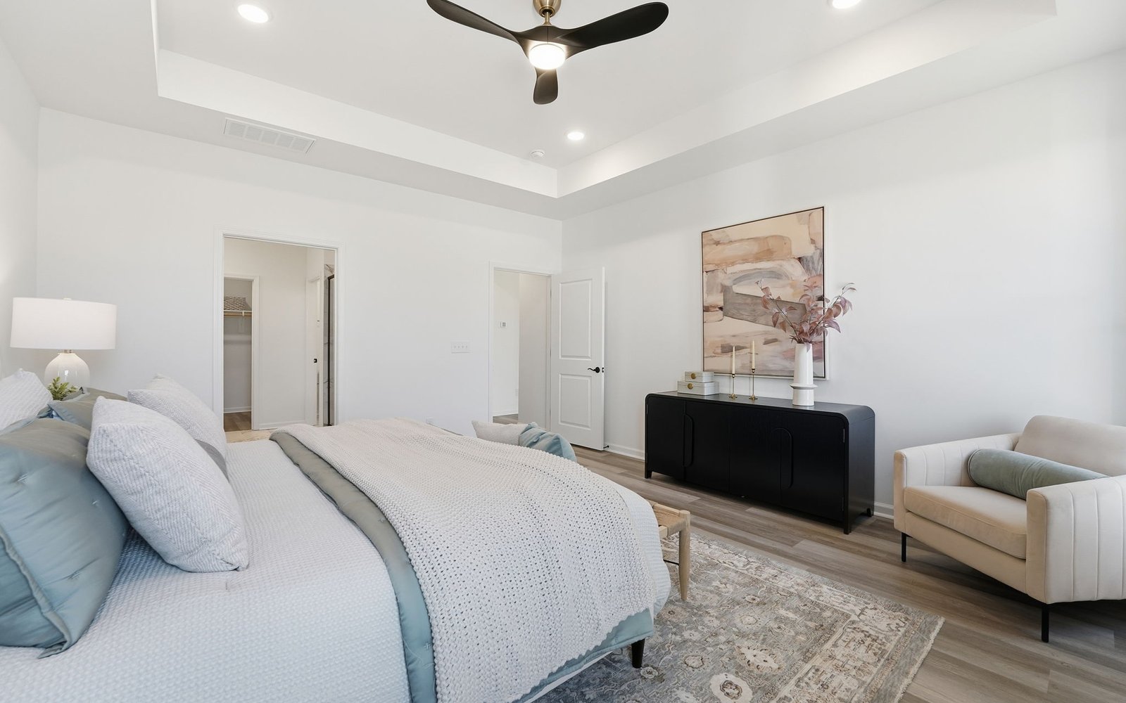 The main level primary bedroom of the Declan by Brookfield Residential.