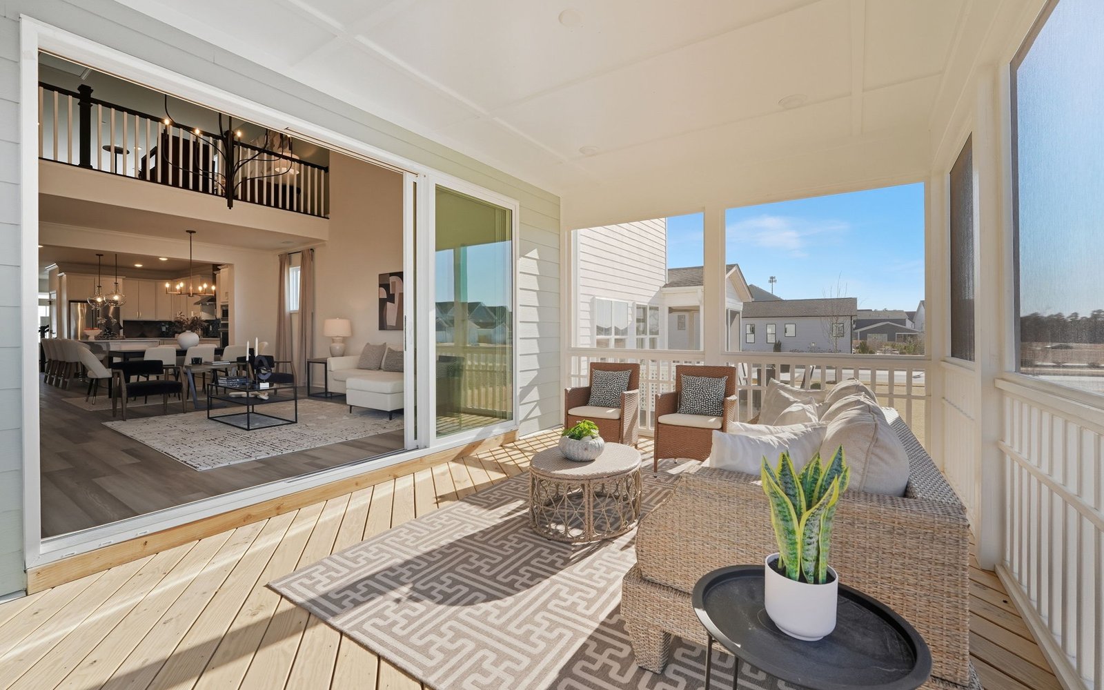 The screen porch with sliding door of the Declan by Brookfield Residential.