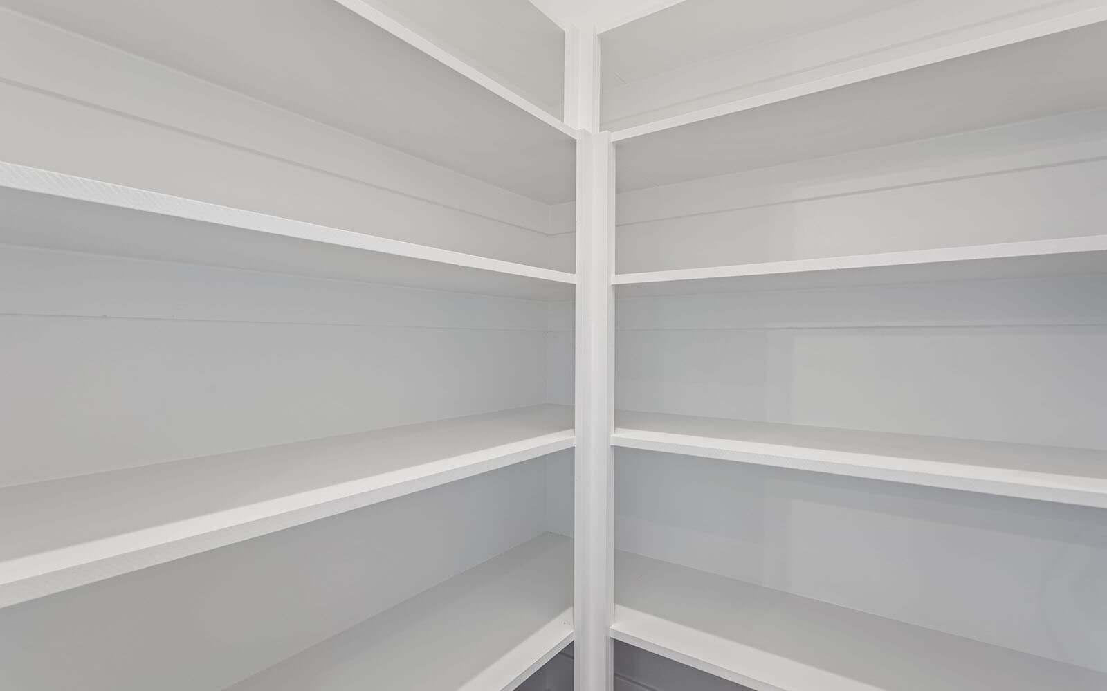 The kitchen pantry of the Mason at Wendell Falls by Brookfield Residential