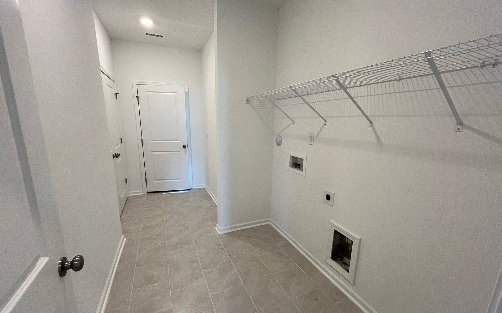 The laundry of the Declan on homesite 2431 by Brookfield Residential at Wendell Falls.