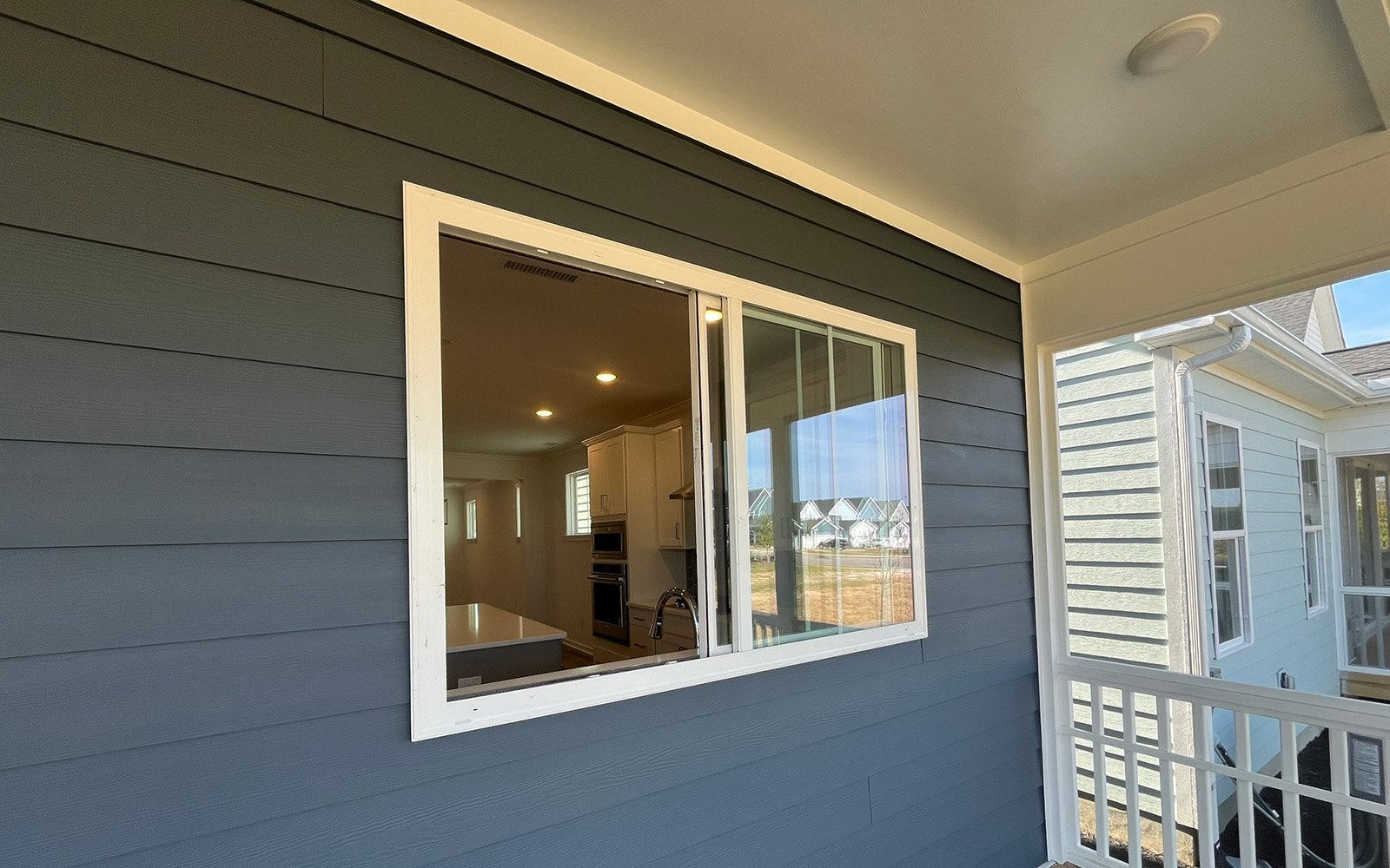 The rear screened porch of the Declan on homesite 2431 by Brookfield Residential at Wendell Falls.