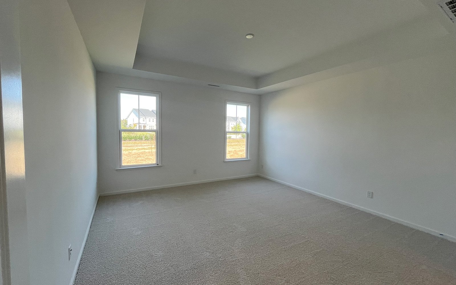 The primary bedroom of the Declan on homesite 2431 by Brookfield Residential at Wendell Falls.