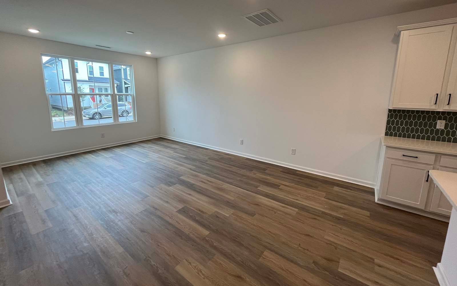 The family room of the Lennox on homesite 2550 by Brookfield Residential at Wendell Falls.