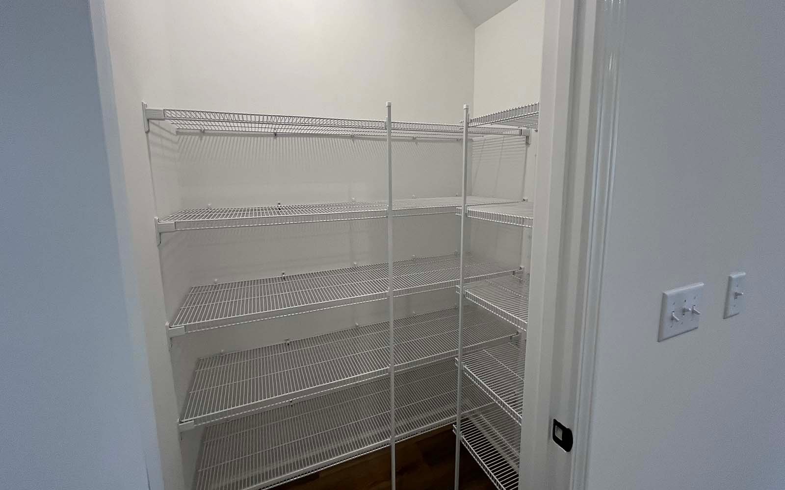 The kitchen pantry of the Lennox on homesite 2550 by Brookfield Residential at Wendell Falls.