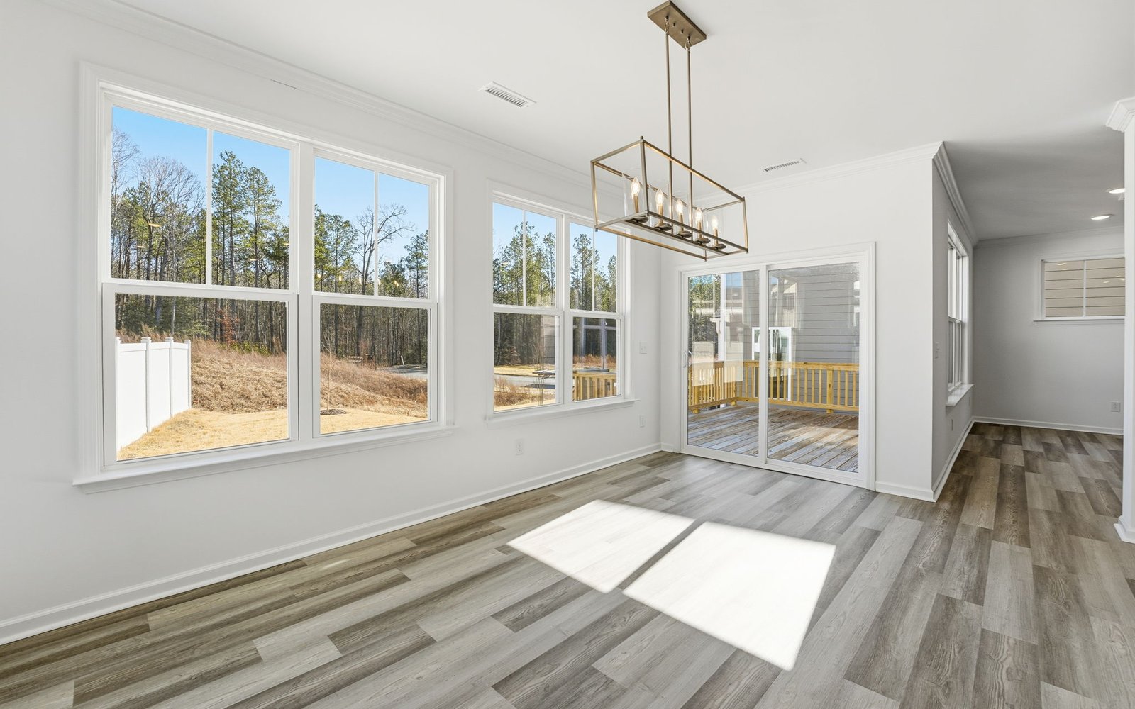 Dining room and deck of the Sterling at Wendell Falls.